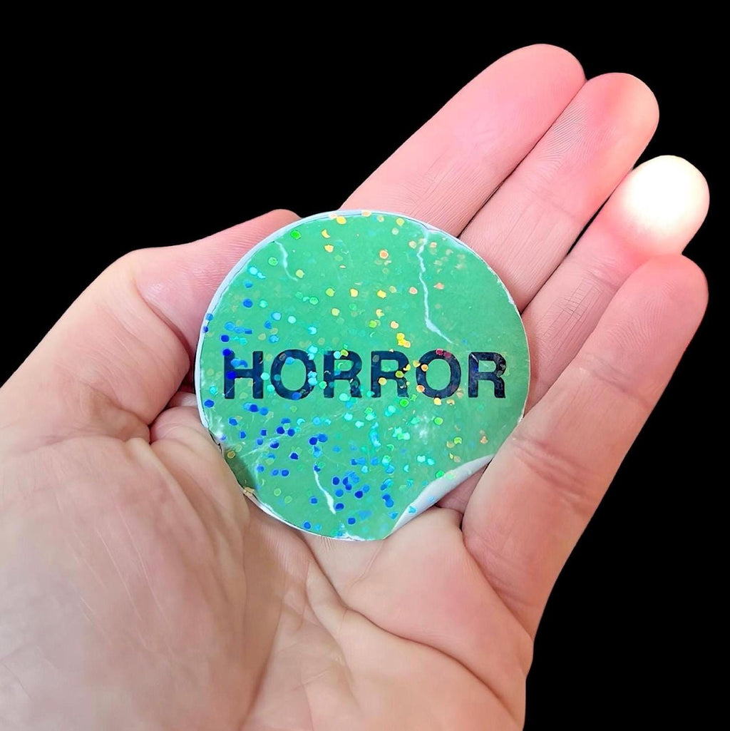 Horror Sticker | 2” Round Horror Movie Rental Sticker | Holographic Horror Genre Sticker