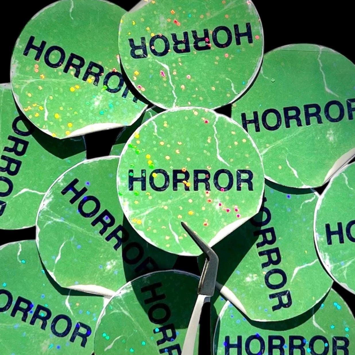 Horror Sticker | 2” Round Horror Movie Rental Sticker | Holographic Horror Genre Sticker